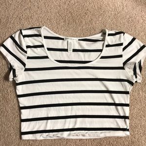 White crop top with black stripes.
